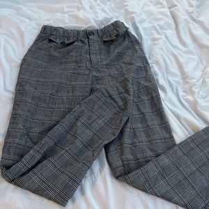 black and white with hints of red sky and sparrow pants S girl